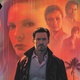 A crop of the poster for Lisa Joy's Reminiscence features Hugh Jackman's character in the foreground with four supporter characters images heavily illustrated in the background.